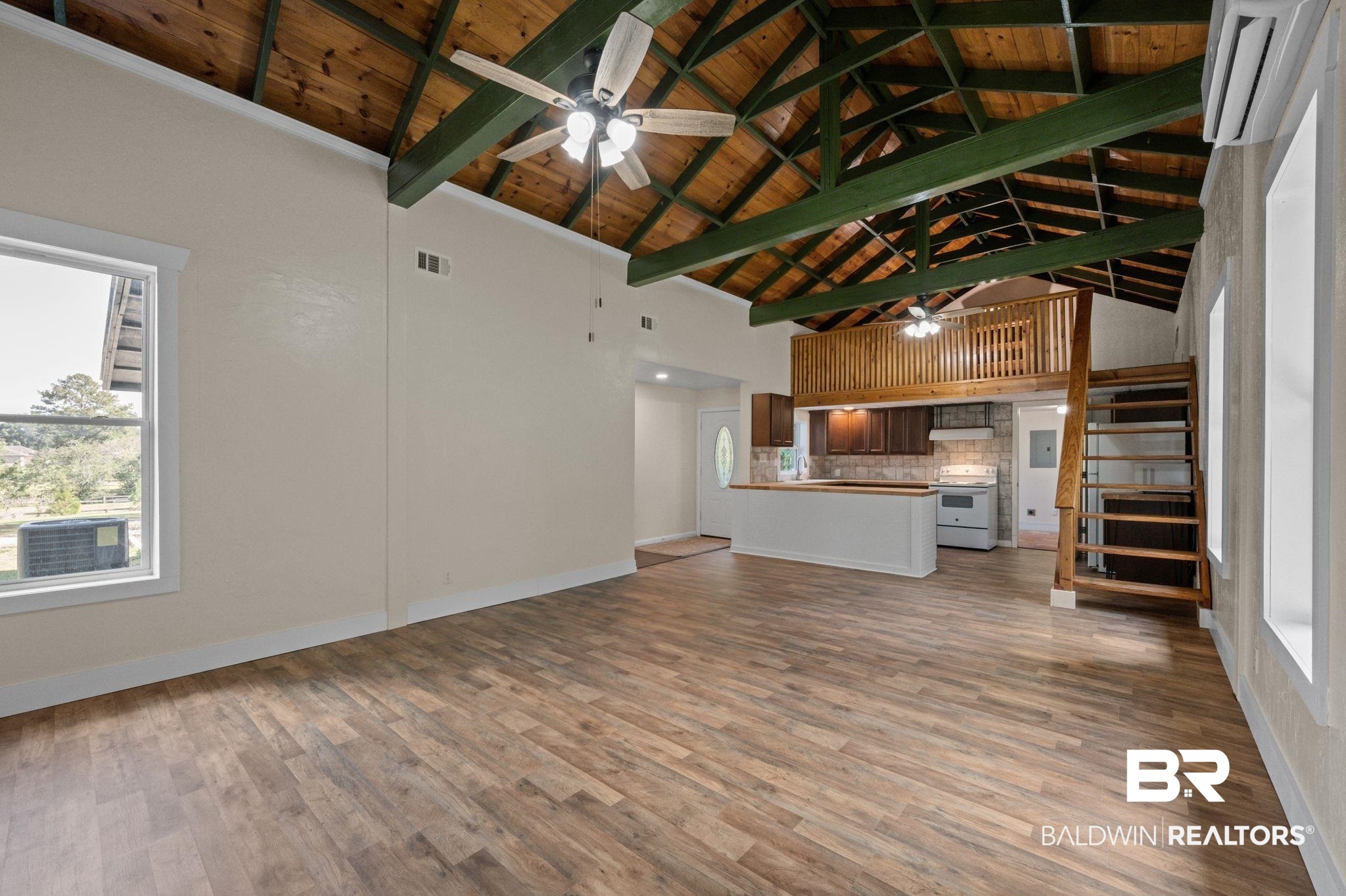 20037 County Road 33 Fairhope, AL 36532 - Photo 46 of 79 Unfurnished living room with hardwood / wood-style floors, beam ceiling, high vaulted ceiling, and wooden ceiling