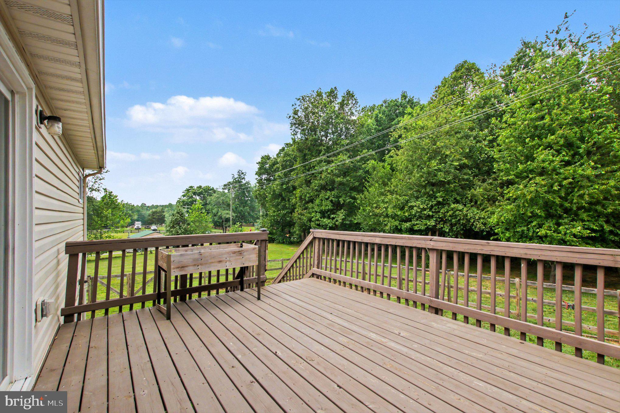 9486 Verdiersville Road Rhoadesville, VA 22542 - Photo 9 of 31 Deck backing to your wooded backyard