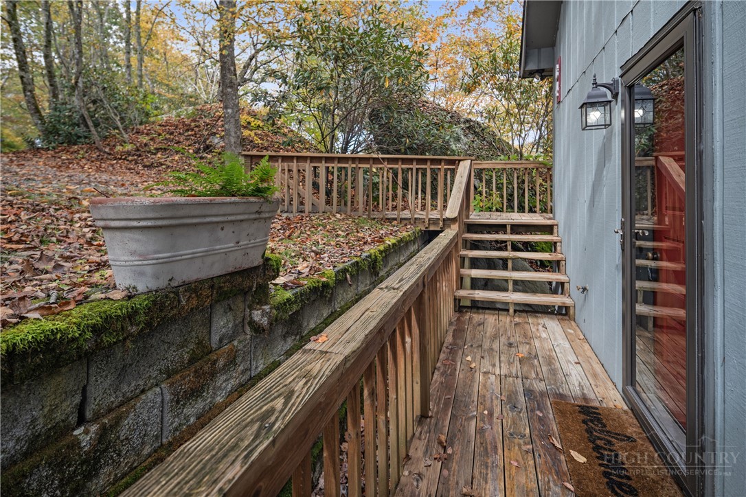 265 Leatherwood Road Banner Elk, NC 28604 - Photo 6 of 42 a view of balcony and wooden floor