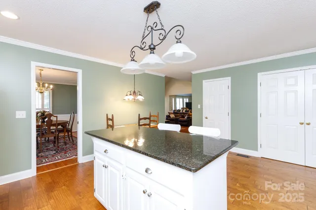 a kitchen with a counter space cabinets and appliances