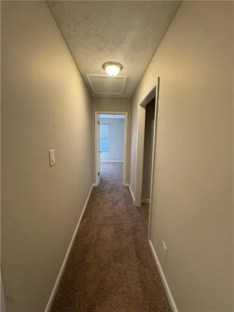 a view of hallway with stairs