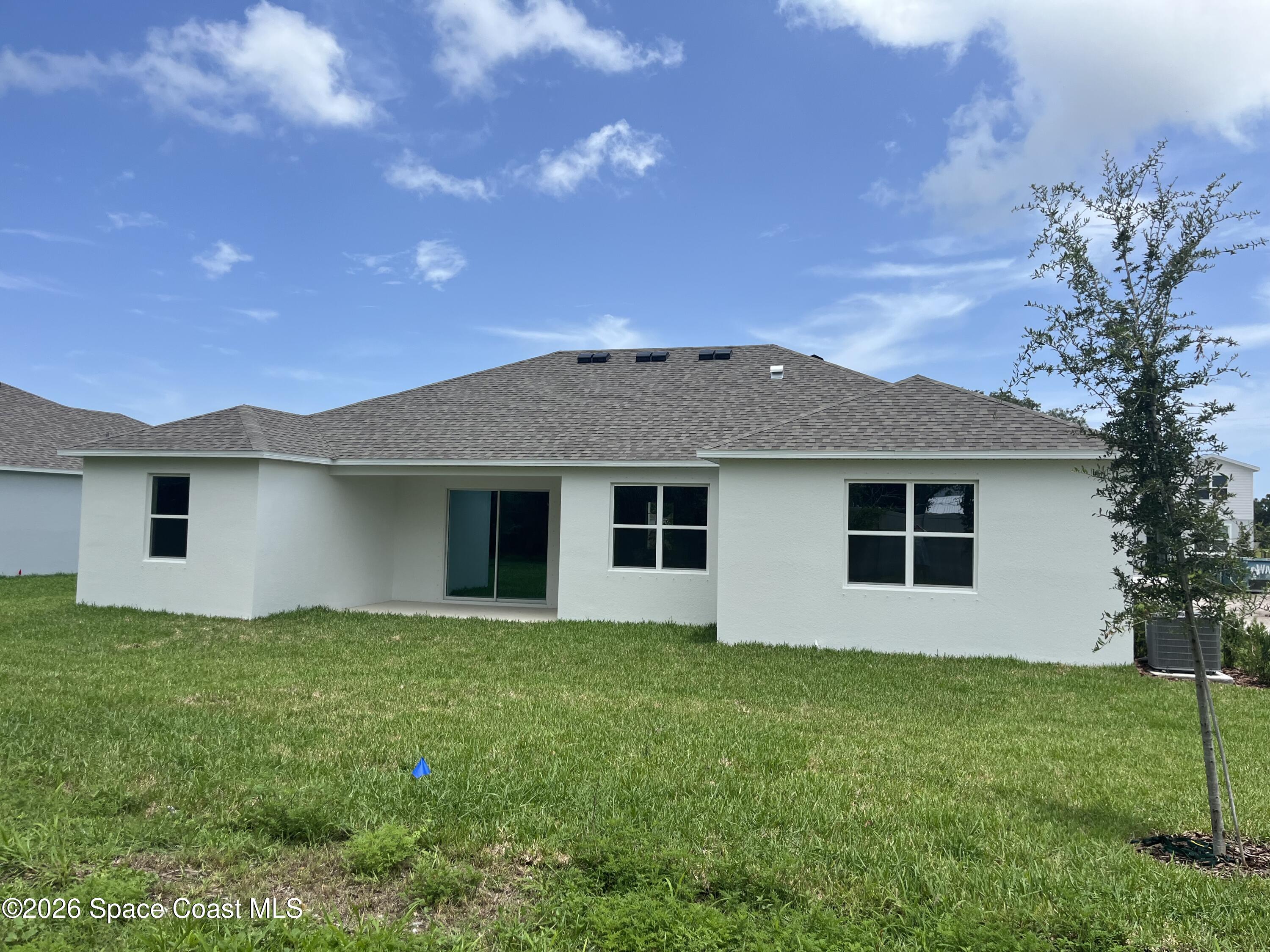 1423 Dunblane Way Northeast Palm Bay, FL 32905 - Photo 6 of 9 Rear Exterior