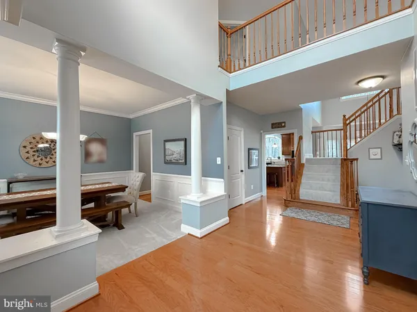 a very nice looking dining room with a table and chairs