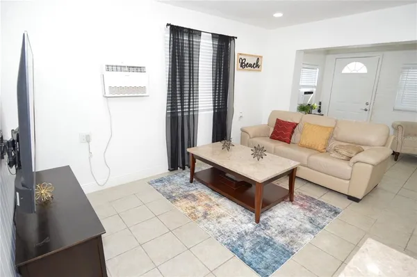 a living room with a couch and a table