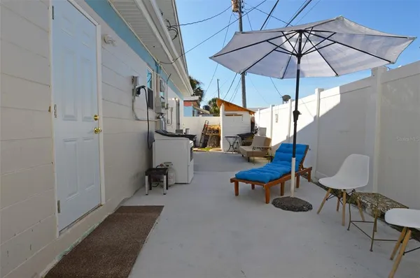 a view of an outdoor space with seating area