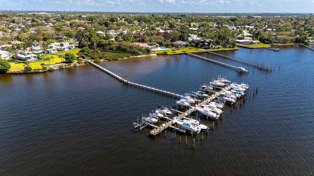 2134 Northwest Tilia Trail Stuart, FL 34994 - Photo 36 of 36 a view of a lake with a room