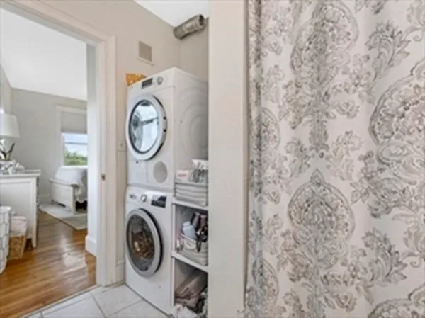 a view of bathroom with washer and dryer