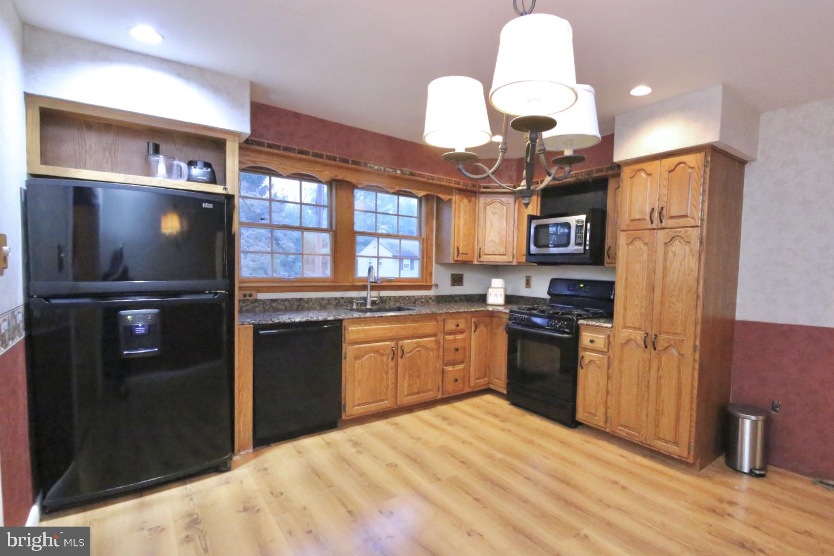 1017 West Front Street Glendora, NJ 08029 - Photo 11 of 34 Oak cabinets and granite countertops.