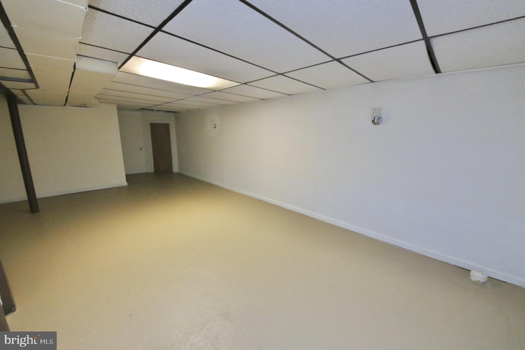1017 West Front Street Glendora, NJ 08029 - Photo 29 of 34 Finished basement with new water proofing system.