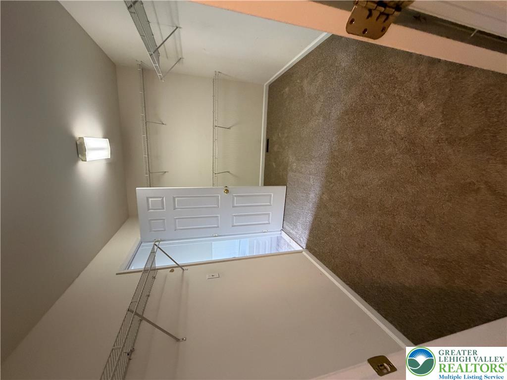 4157 Walter Road Bethlehem, PA 18020 - Photo 16 of 36 A spacious walk-in closet offers ample storage with wire shelving. Master Suite