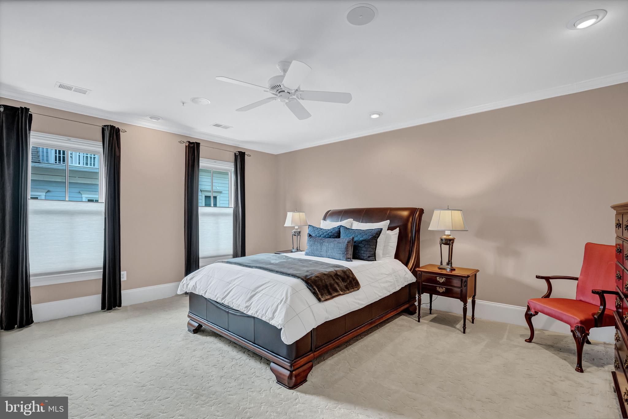 708 Day Lane Alexandria, VA 22314 - Photo 22 of 39 a bedroom with a bed and a chandelier