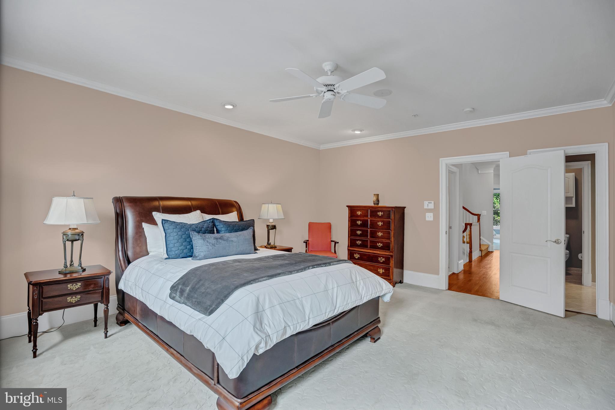 708 Day Lane Alexandria, VA 22314 - Photo 23 of 39 a bedroom with a bed and a lamp on a dresser
