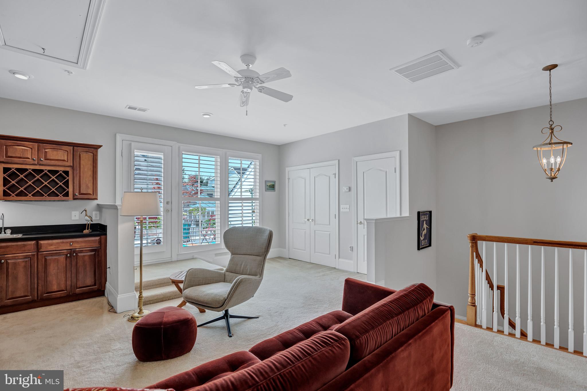 708 Day Lane Alexandria, VA 22314 - Photo 31 of 39 a living room with furniture ceiling fan and a window