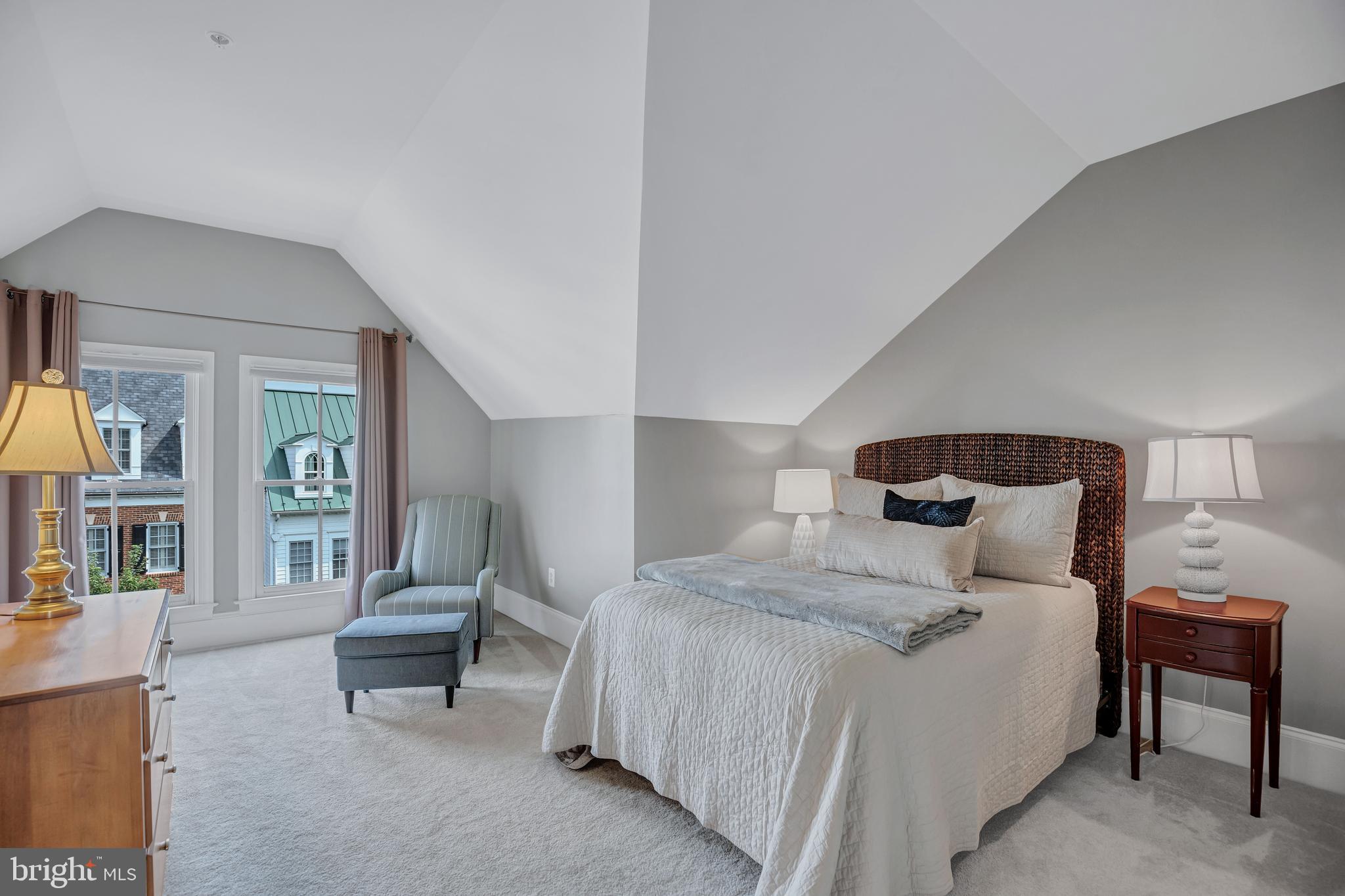 708 Day Lane Alexandria, VA 22314 - Photo 34 of 39 a bedroom with a bed and a chair