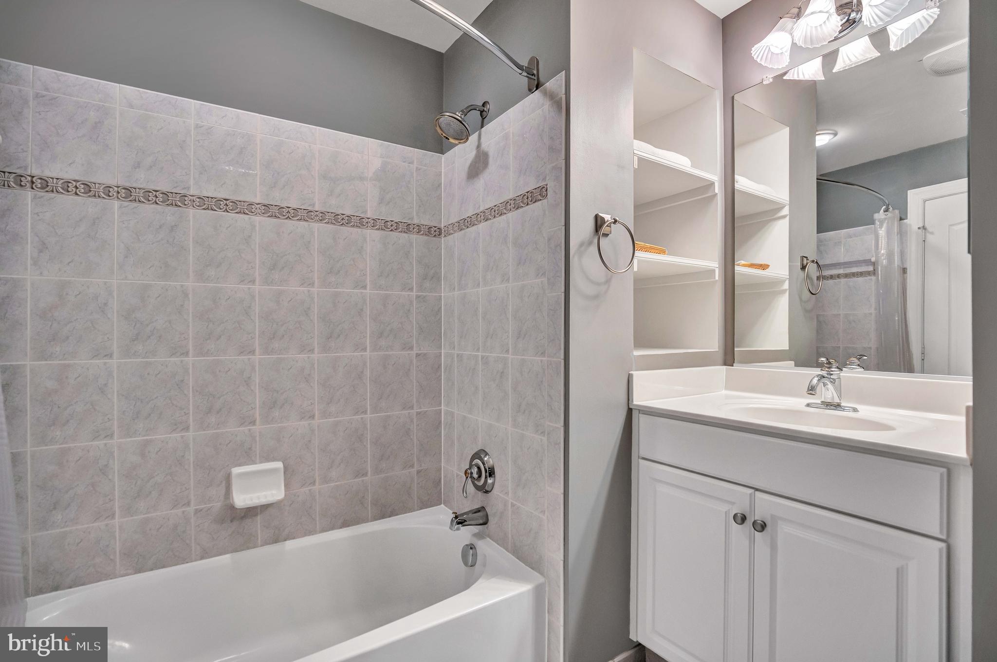 708 Day Lane Alexandria, VA 22314 - Photo 37 of 39 a bathroom with a sink and a bathtub