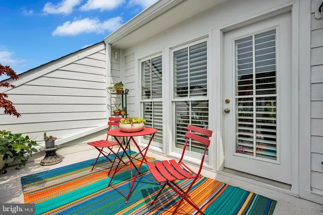 a backyard of a house with seating space
