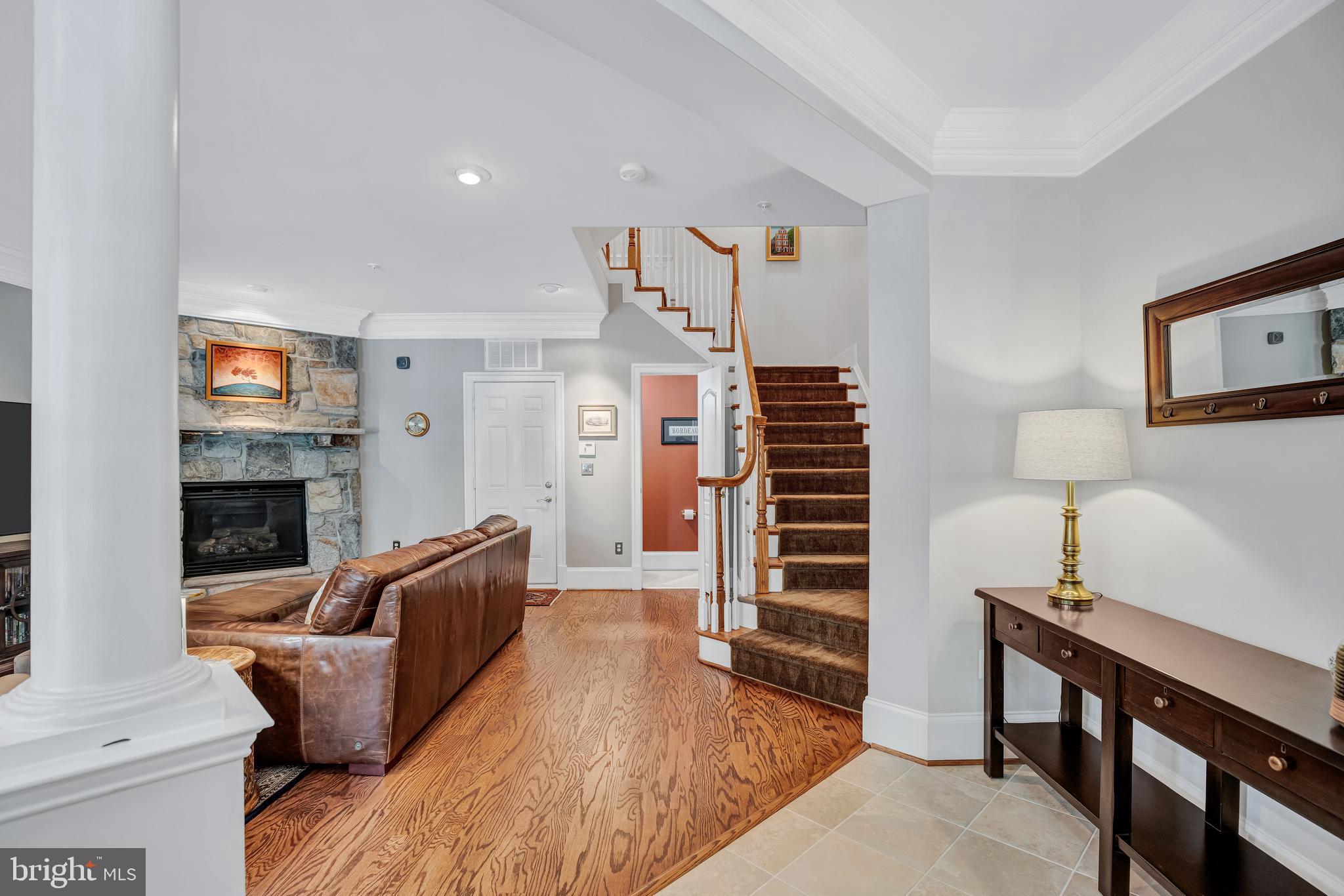 708 Day Lane Alexandria, VA 22314 - Photo 4 of 39 a living room with furniture and a fireplace