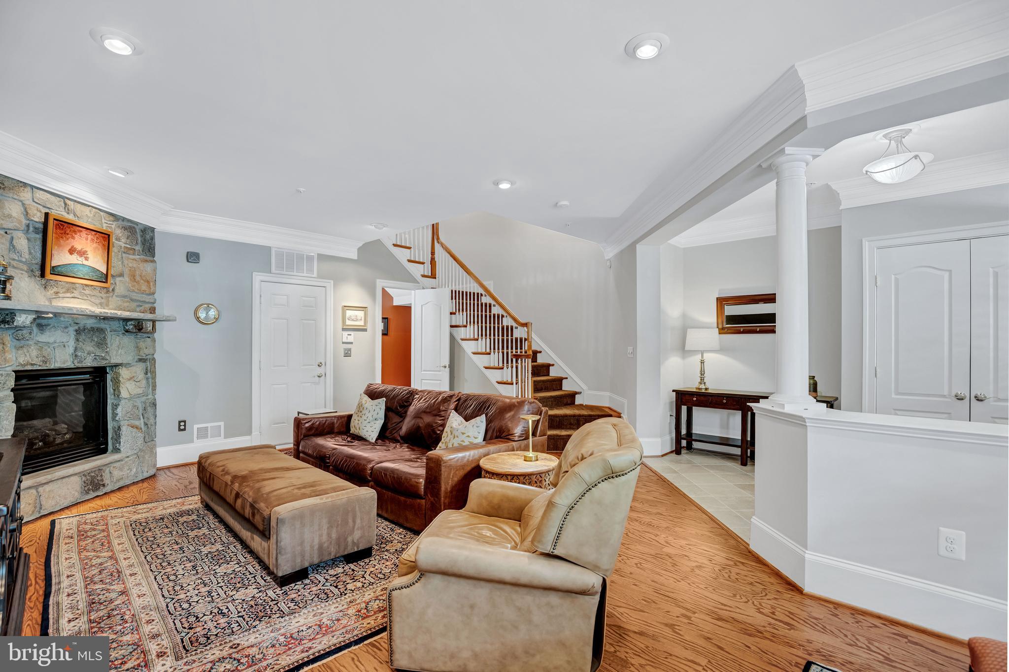 708 Day Lane Alexandria, VA 22314 - Photo 5 of 39 a living room with furniture and a fireplace