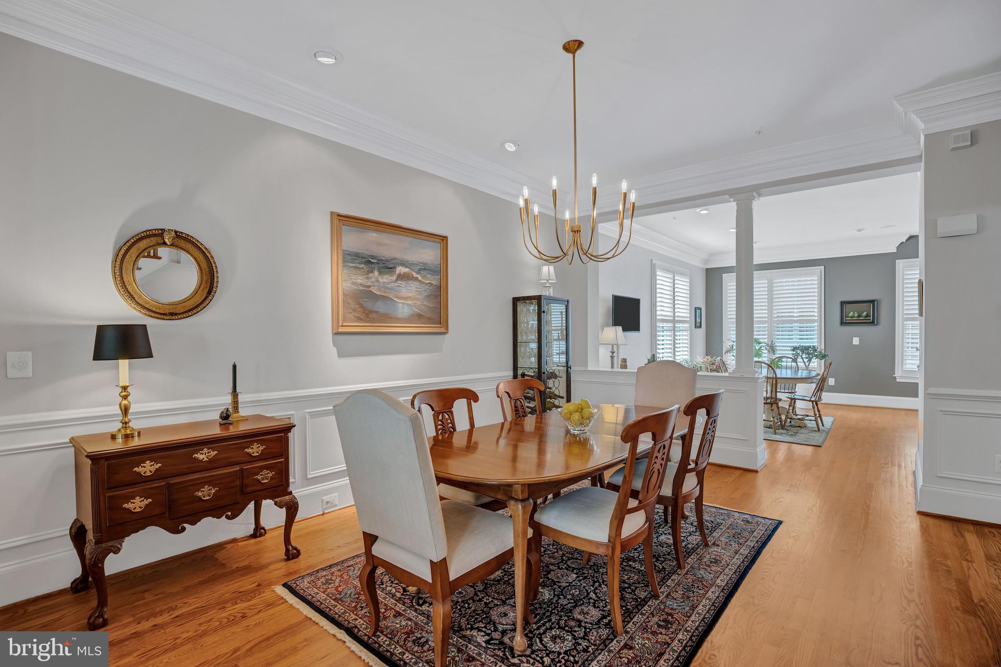 708 Day Lane Alexandria, VA 22314 - Photo 7 of 39 a view of a dining room with furniture wooden floor and a chandelier