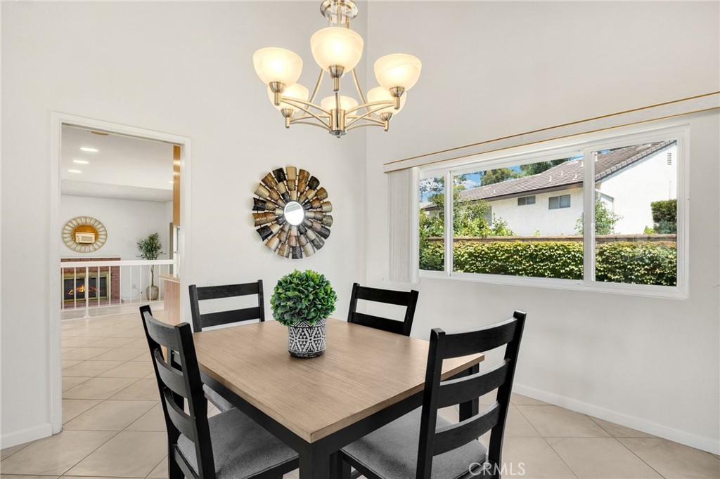 1342 Beechwood Drive Brea, CA 92821 - Photo 12 of 43 a dining room with furniture and chandelier