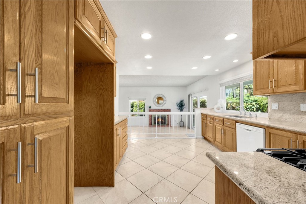 1342 Beechwood Drive Brea, CA 92821 - Photo 15 of 43 a kitchen with stainless steel appliances granite countertop a refrigerator and a stove top oven