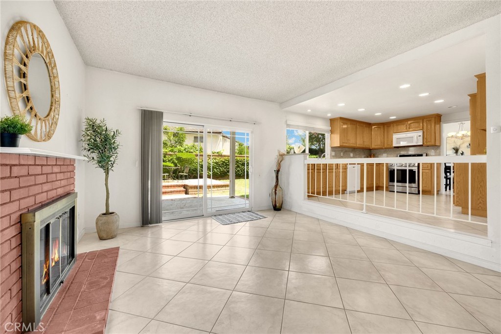 1342 Beechwood Drive Brea, CA 92821 - Photo 18 of 43 a view of a kitchen with furniture and a fireplace