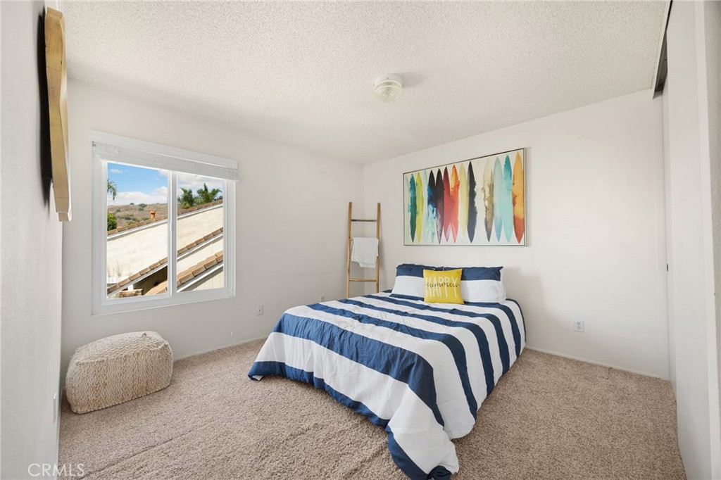 1342 Beechwood Drive Brea, CA 92821 - Photo 27 of 43 a bedroom with a bed and a window