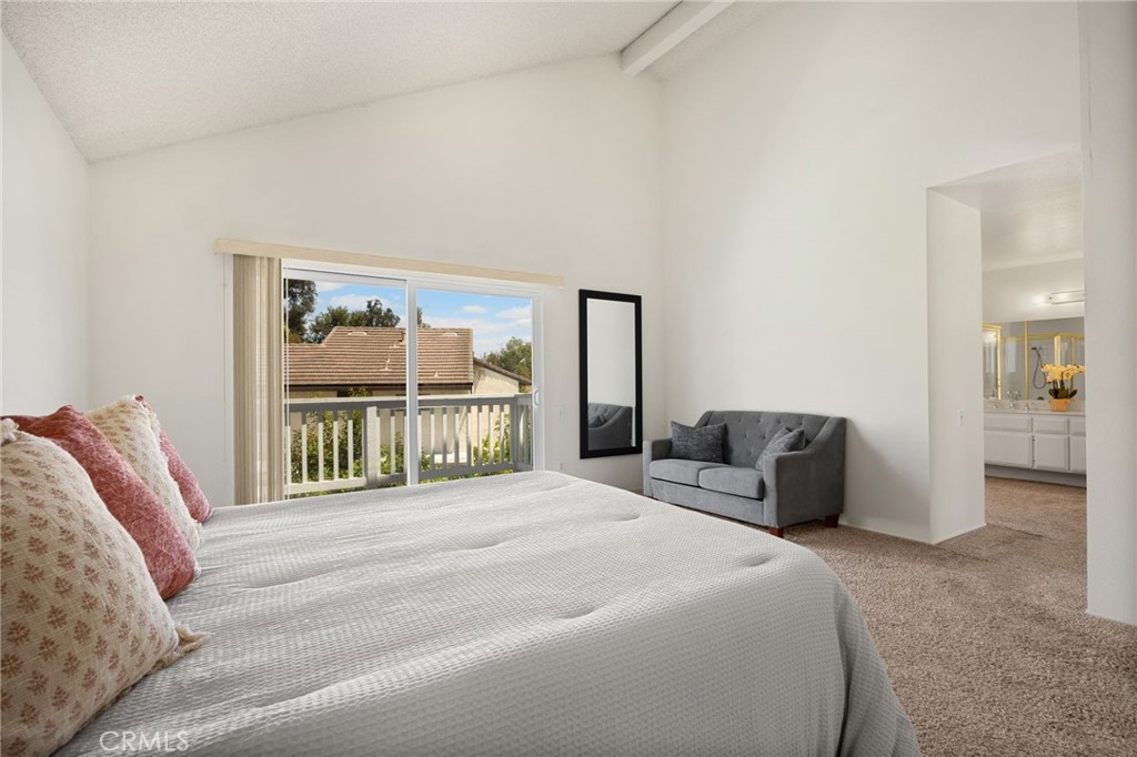 1342 Beechwood Drive Brea, CA 92821 - Photo 29 of 43 a bedroom with a bed and a large window