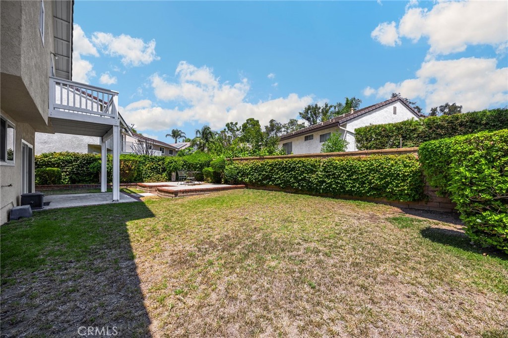 1342 Beechwood Drive Brea, CA 92821 - Photo 36 of 43 a view of a swimming pool with a yard