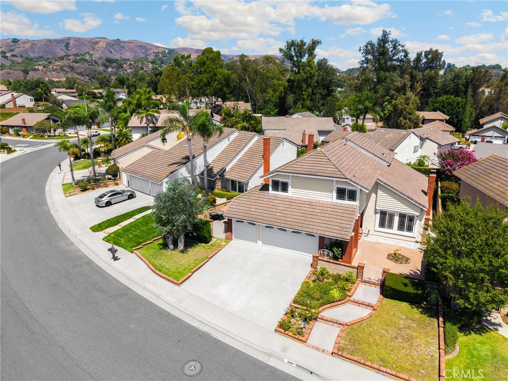 1342 Beechwood Drive Brea, CA 92821 - Photo 41 of 43 an aerial view of residential houses with outdoor space and parking