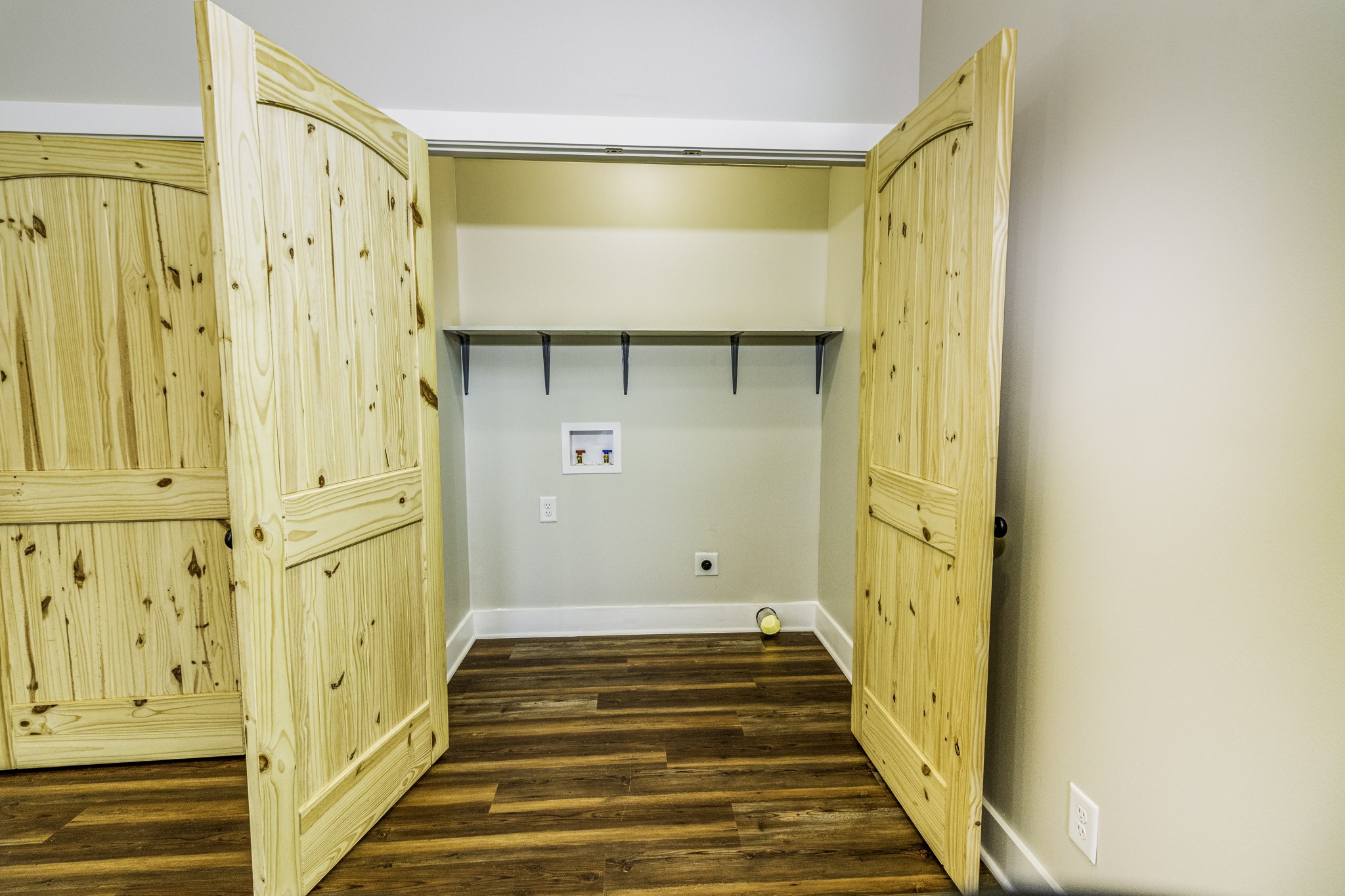 2081 Fall River Road Leoma, TN 38468 - Photo 11 of 15 a view of a bathroom with wooden floor and white walls