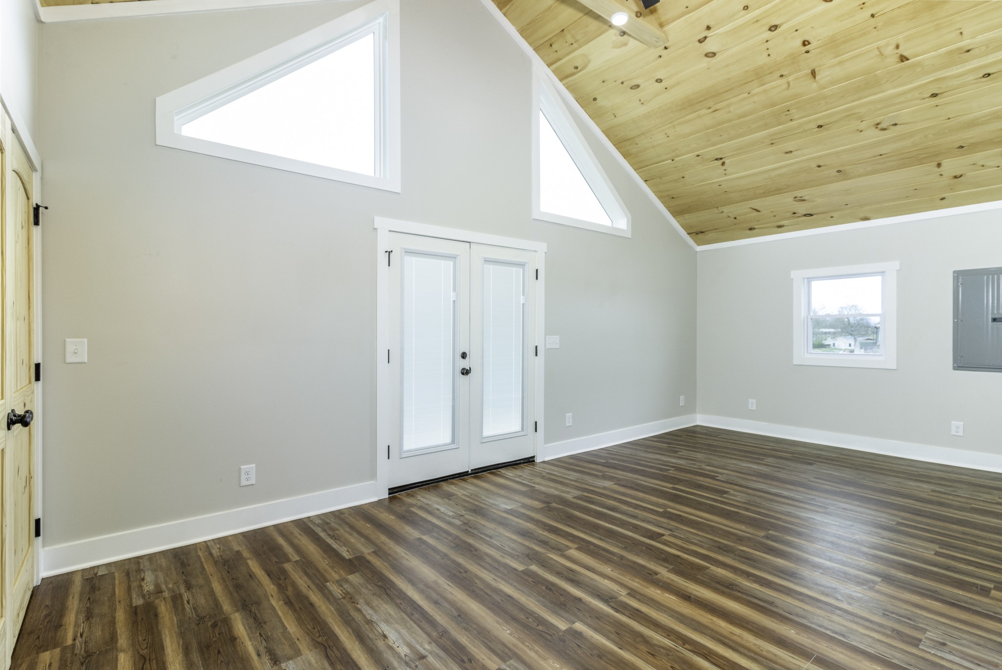 2081 Fall River Road Leoma, TN 38468 - Photo 5 of 15 a view of an empty room with wooden floor and a window
