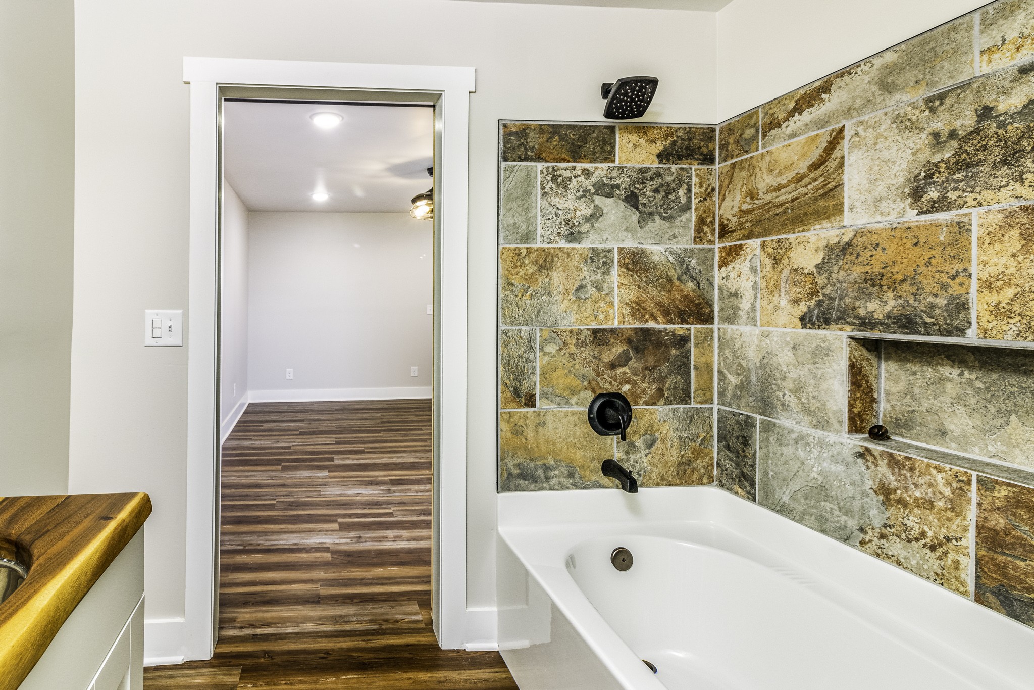 2081 Fall River Road Leoma, TN 38468 - Photo 9 of 15 a bathroom with a bathtub and shower