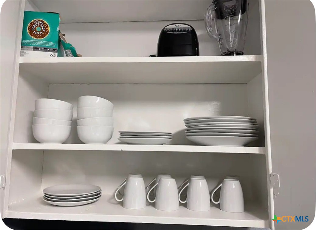 284 Perryman Street New Braunfels, TX 78130 - Photo 12 of 41 a close view of cabinet