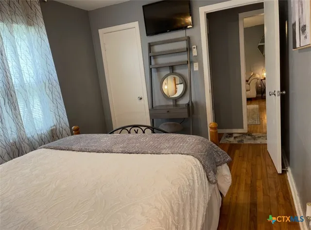 a view of entryway with wooden floor