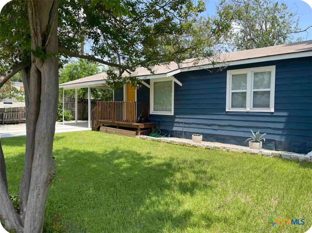 284 Perryman Street New Braunfels, TX 78130 - Photo 32 of 41 a view of house with backyard space and garden