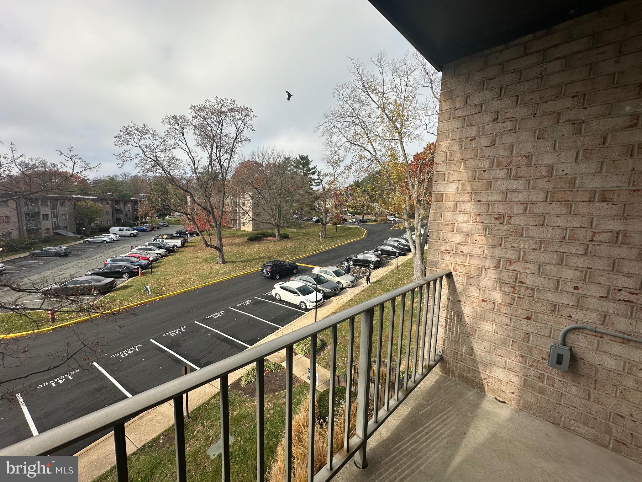 3722 Bel Pre Road, Unit 12 Silver Spring, MD 20906 - Photo 23 of 26 a view of a balcony with an outdoor space