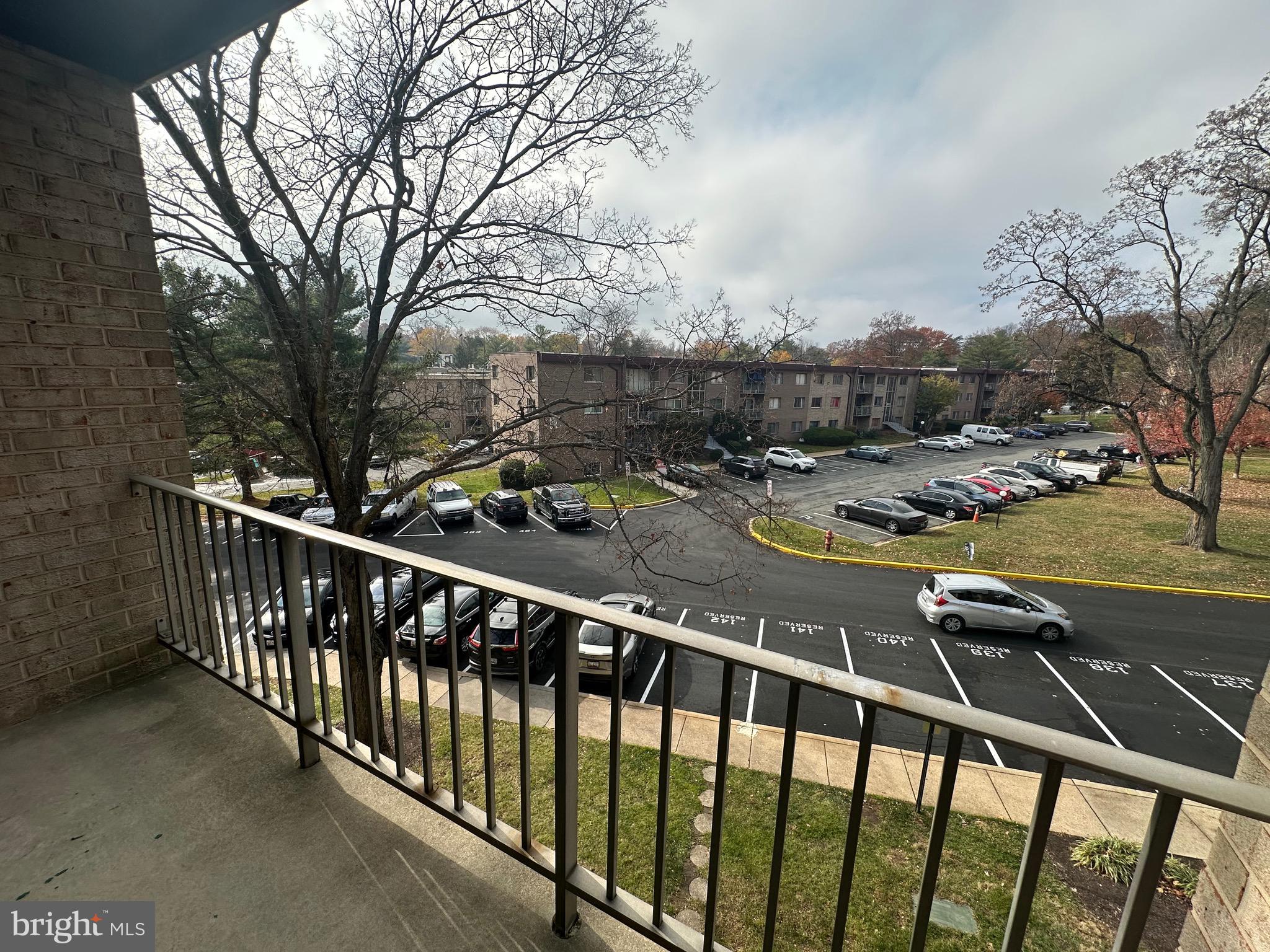 3722 Bel Pre Road, Unit 12 Silver Spring, MD 20906 - Photo 24 of 26 a view of a balcony with chairs