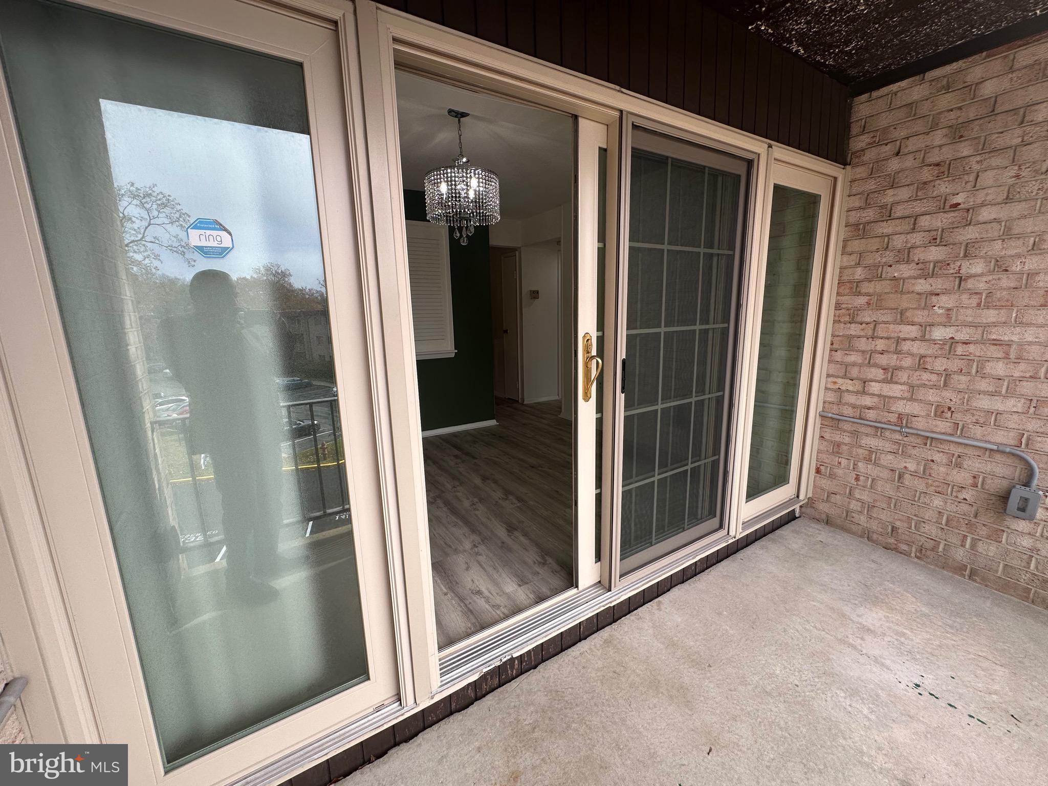 3722 Bel Pre Road, Unit 12 Silver Spring, MD 20906 - Photo 25 of 26 a view of a door and a window