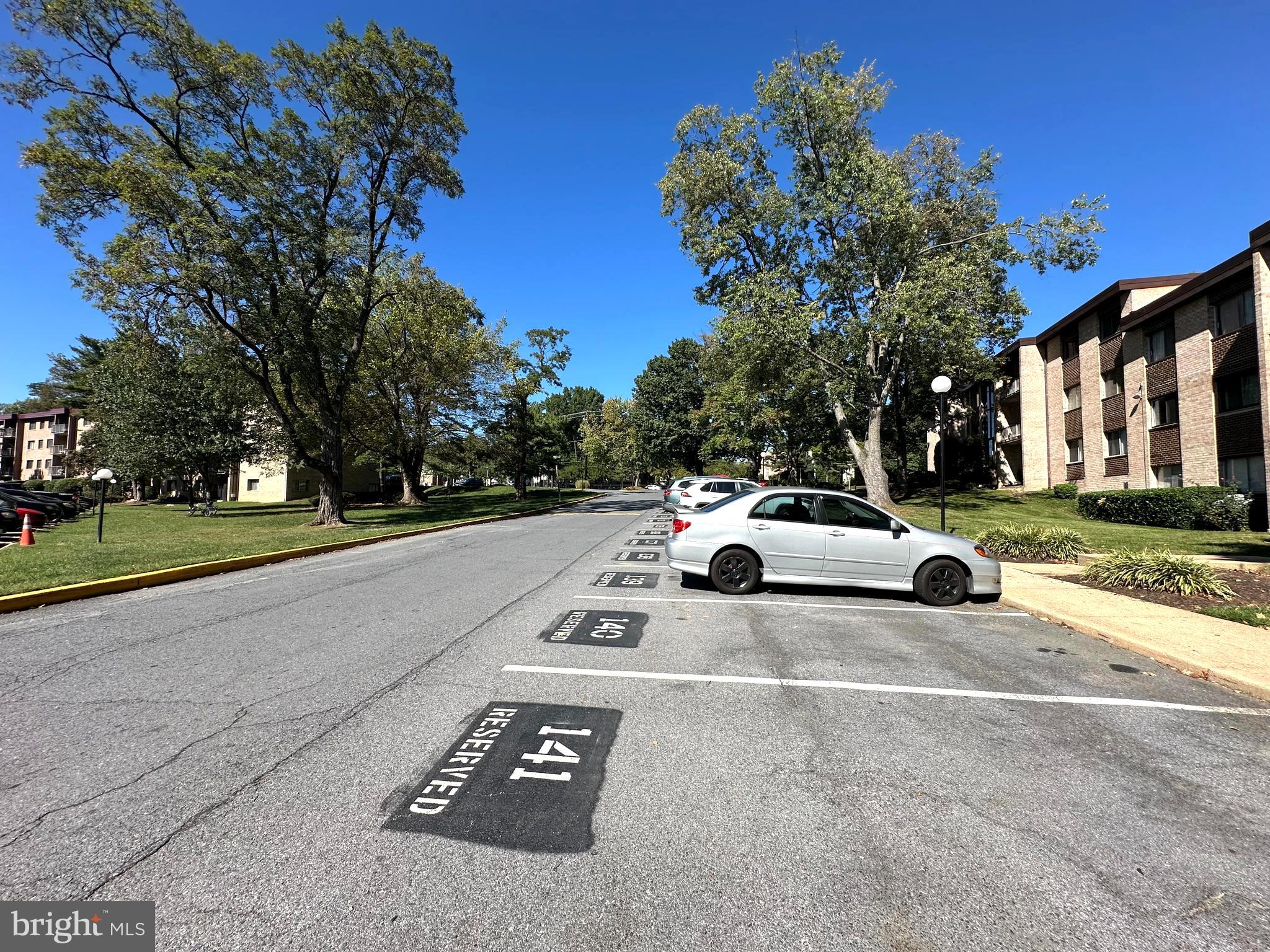 3722 Bel Pre Road, Unit 12 Silver Spring, MD 20906 - Photo 3 of 26 a view of street with parked cars