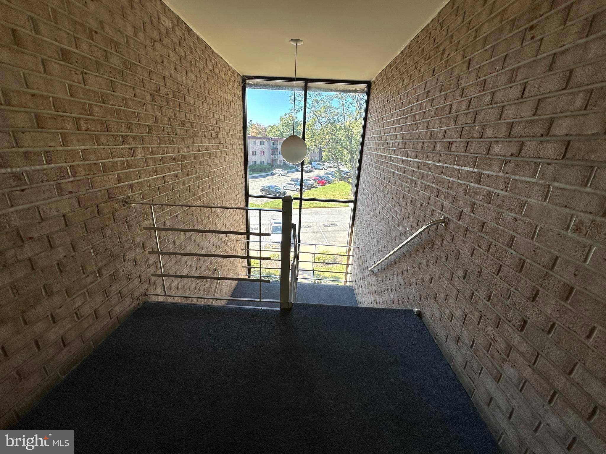 3722 Bel Pre Road, Unit 12 Silver Spring, MD 20906 - Photo 5 of 26 a view of empty room with windows