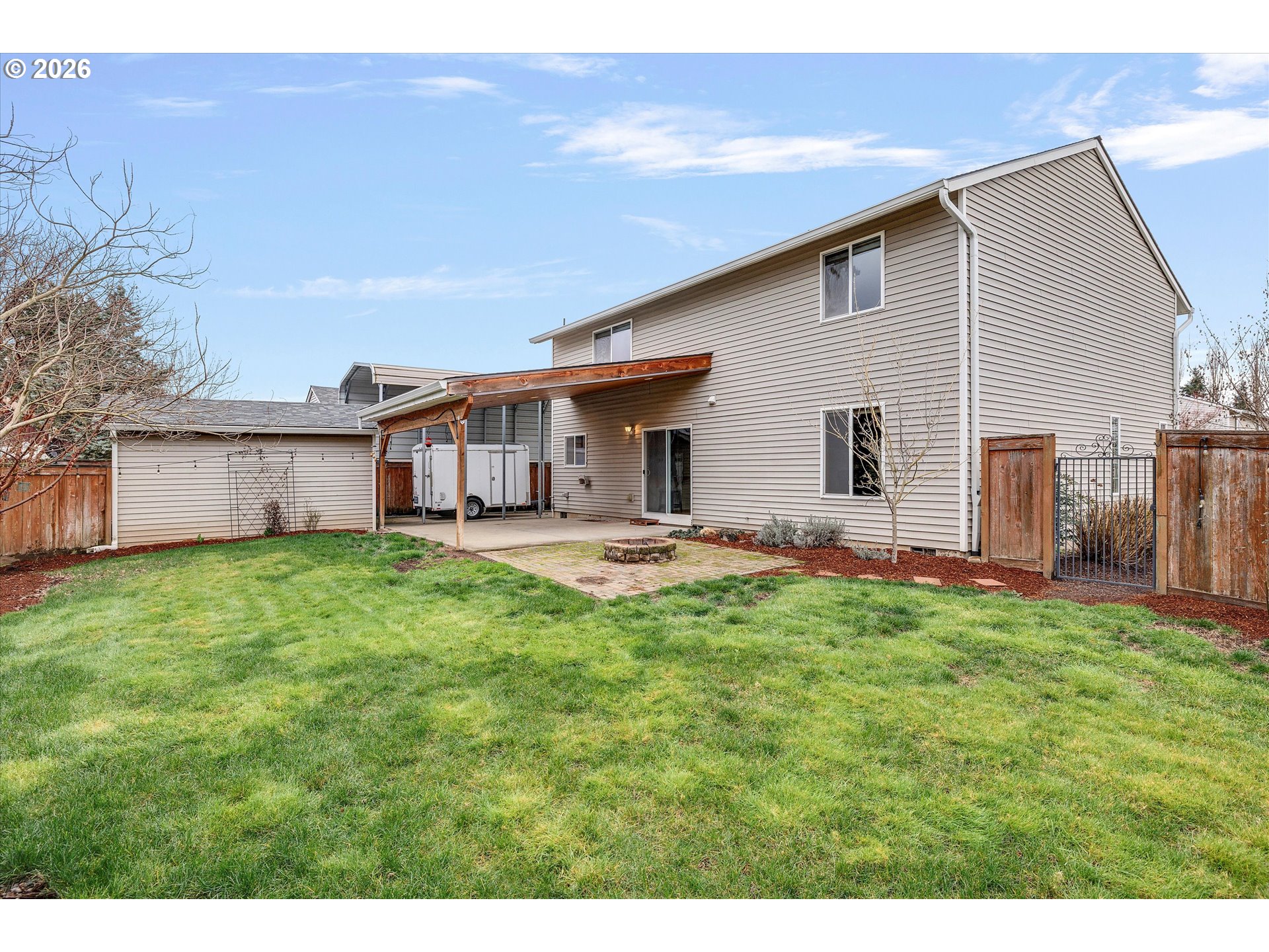 2366 Baines Boulevard Hubbard, OR 97032 - Photo 32 of 48 a view of a house with a backyard