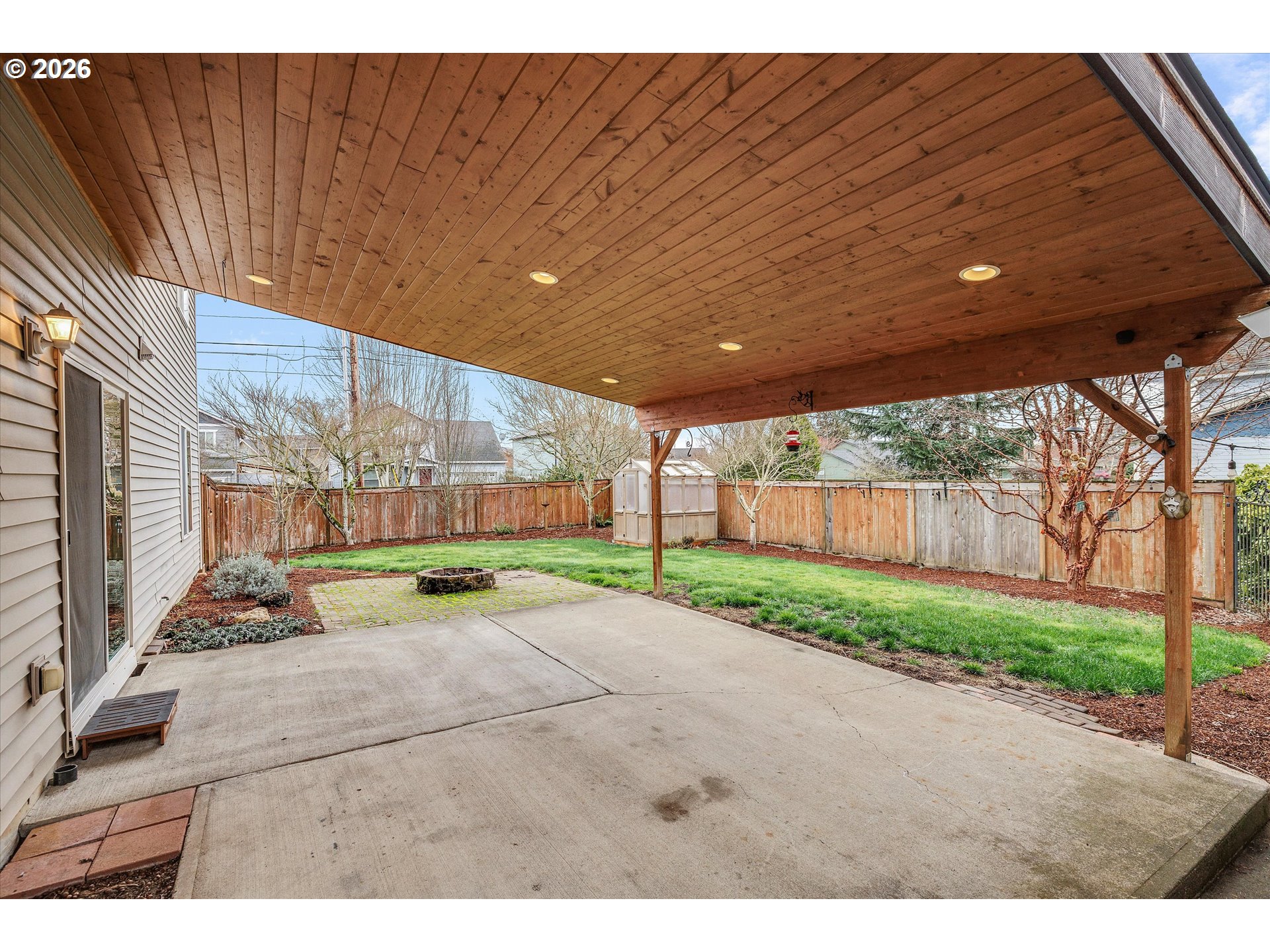 2366 Baines Boulevard Hubbard, OR 97032 - Photo 35 of 48 a view of a patio with a table and chairs