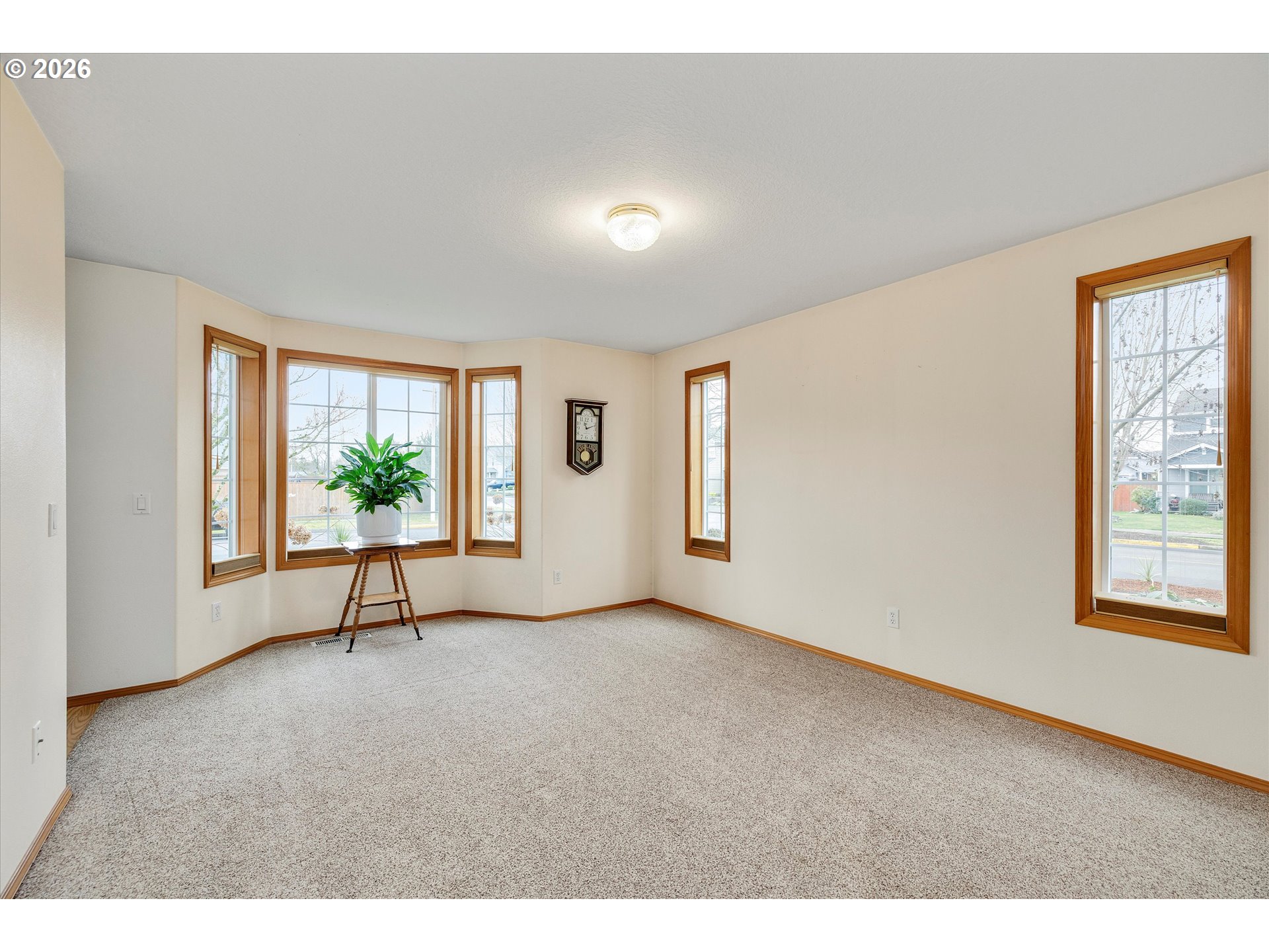 2366 Baines Boulevard Hubbard, OR 97032 - Photo 5 of 48 a view of an empty room with a window