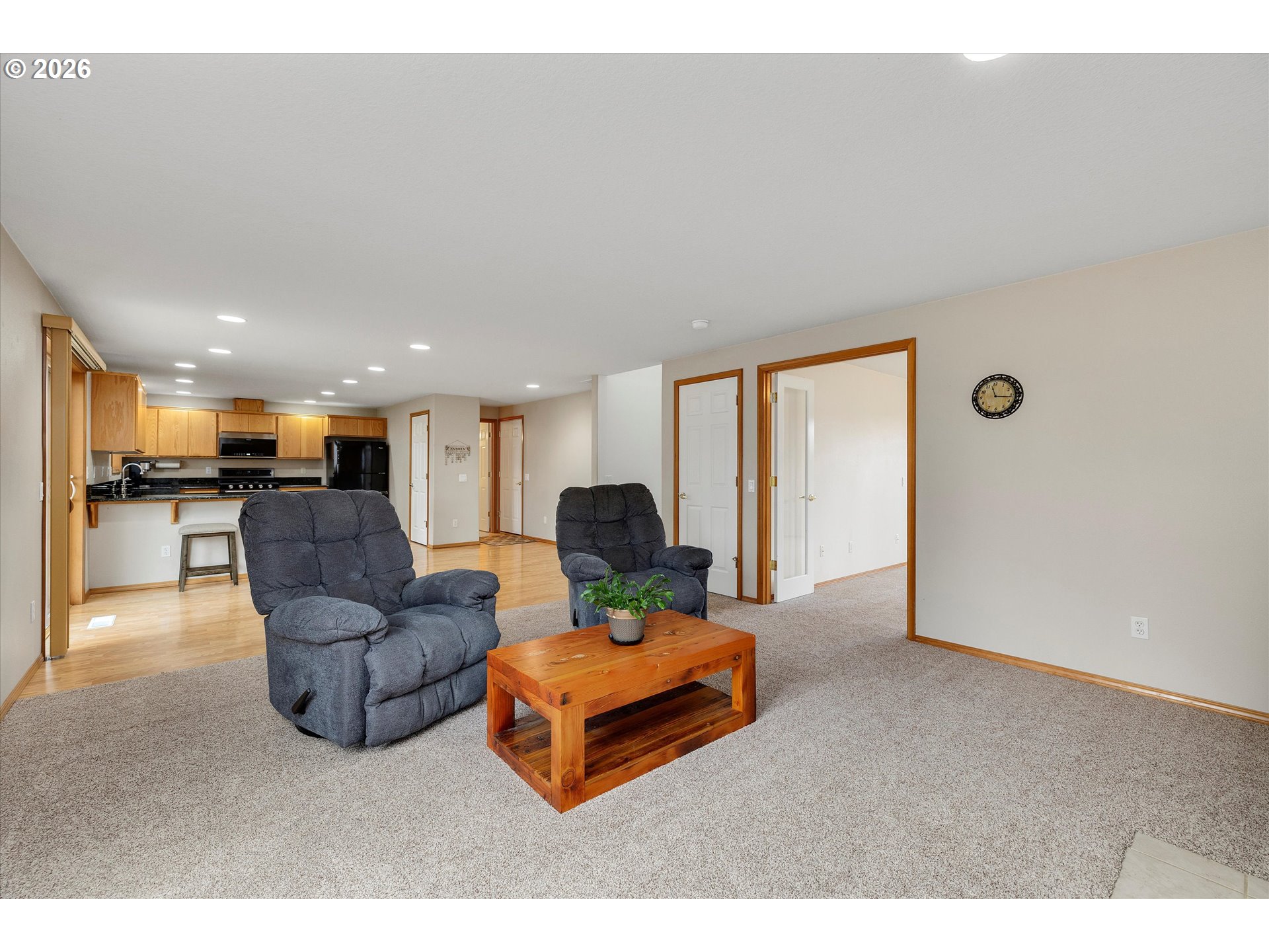 2366 Baines Boulevard Hubbard, OR 97032 - Photo 10 of 48 a living room with furniture and a large window