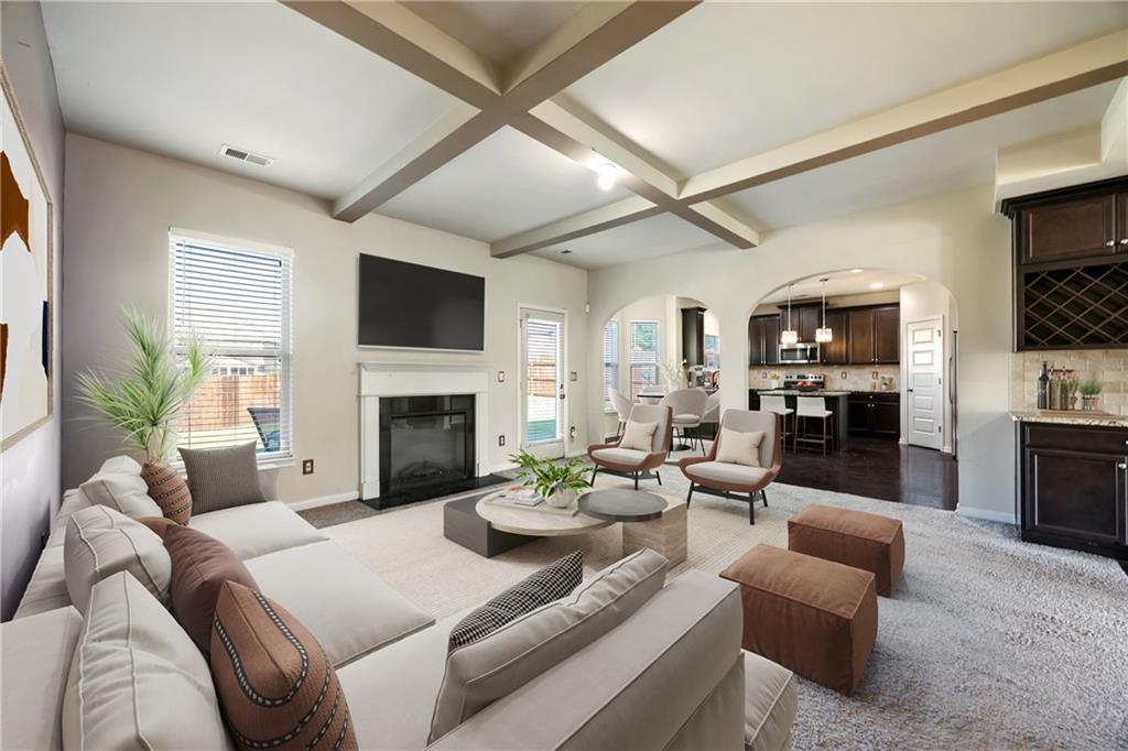 6891 Dresden Drive Rex, GA 30273 - Photo 1 of 26 a living room with furniture a fireplace and a flat screen tv