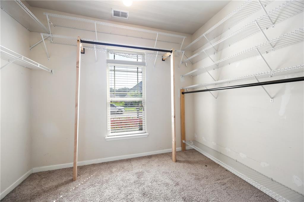 6891 Dresden Drive Rex, GA 30273 - Photo 15 of 26 a view of an empty room with a window