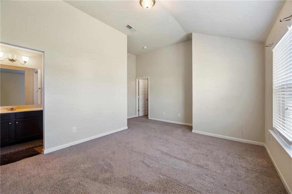 6891 Dresden Drive Rex, GA 30273 - Photo 21 of 26 a view of an empty room with a window
