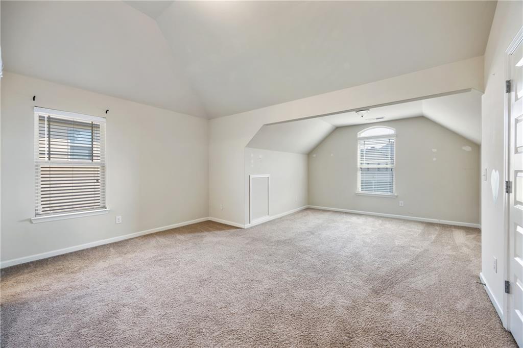 6891 Dresden Drive Rex, GA 30273 - Photo 23 of 26 an empty room with windows and closet
