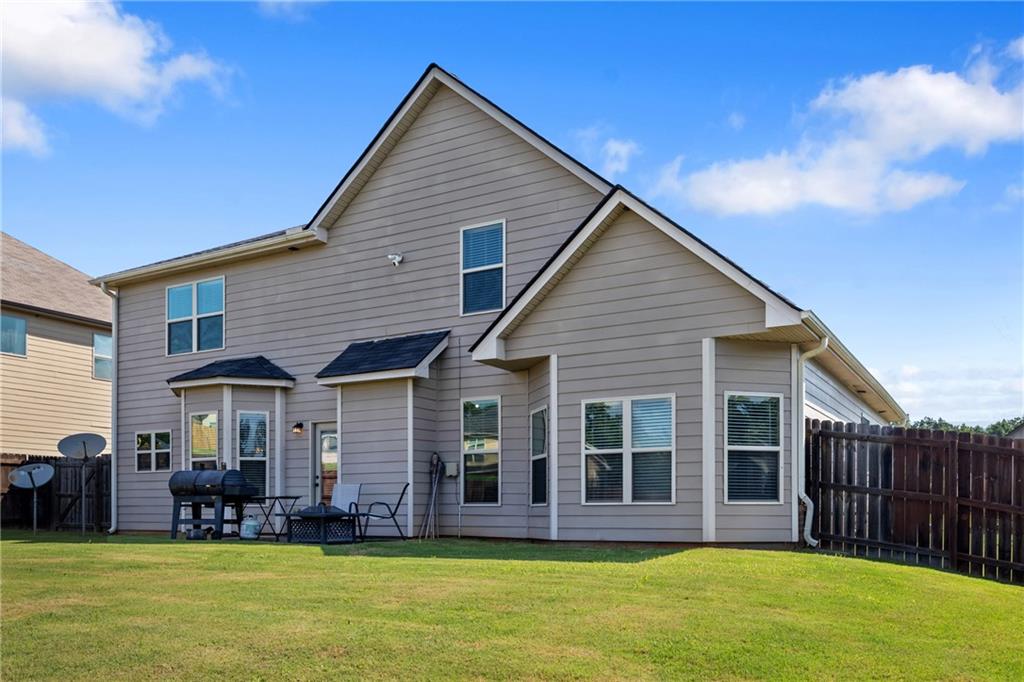 6891 Dresden Drive Rex, GA 30273 - Photo 26 of 26 a view of a house with a swimming pool